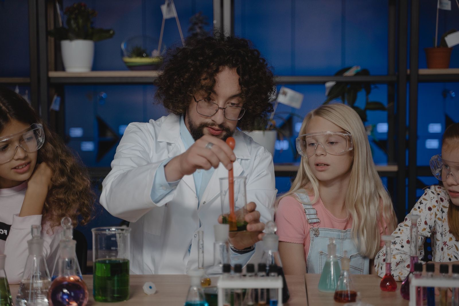 Teacher running a chemistry demonstration for students