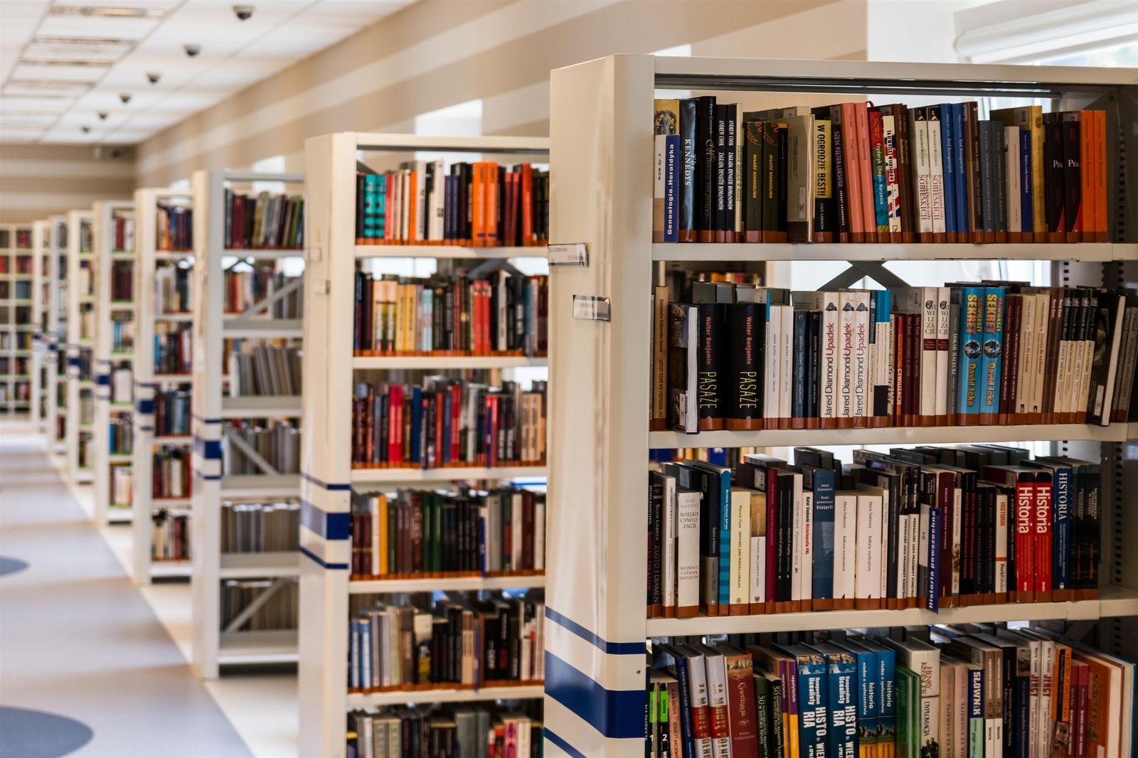 Rows of library shelves filled with books