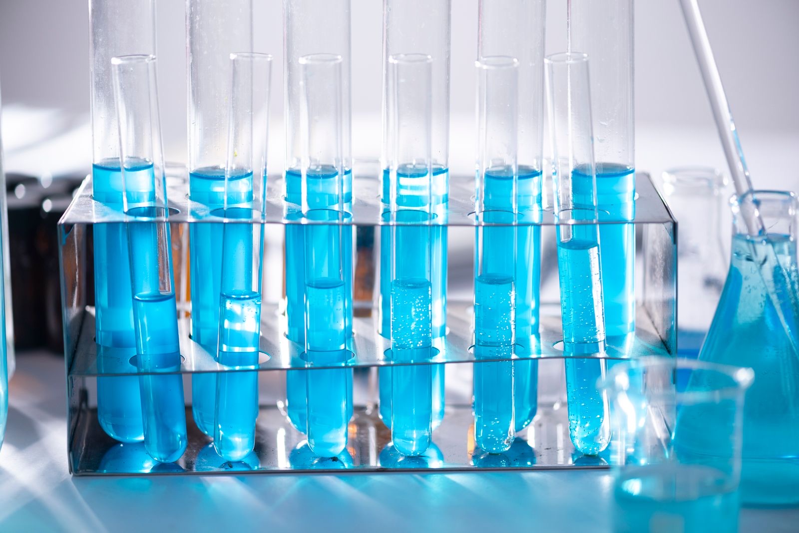 Rack of test tubes containing blue solution